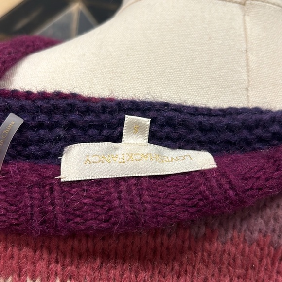 LoveShackFancy sweater
look at all pictures, especially the shoulders - Picture 7 of 8